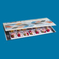 Manrex-Card-Laying-Down-Shot-on-Blue